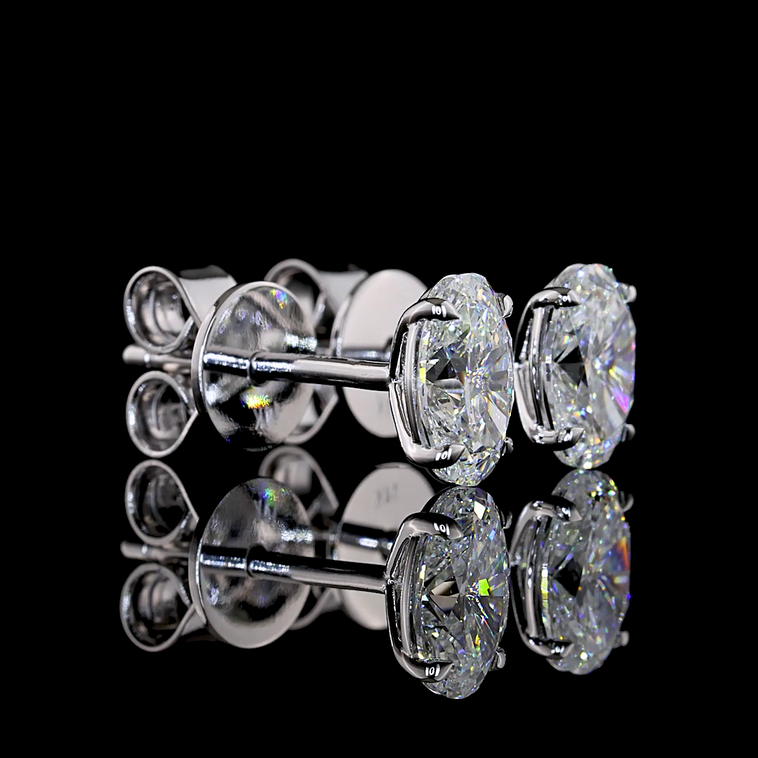 1.09 CT Oval Lab Grown Diamond Stud Earrings in 14K White Gold