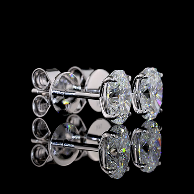 1.09 CT Oval Lab Grown Diamond Stud Earrings in 14K White Gold