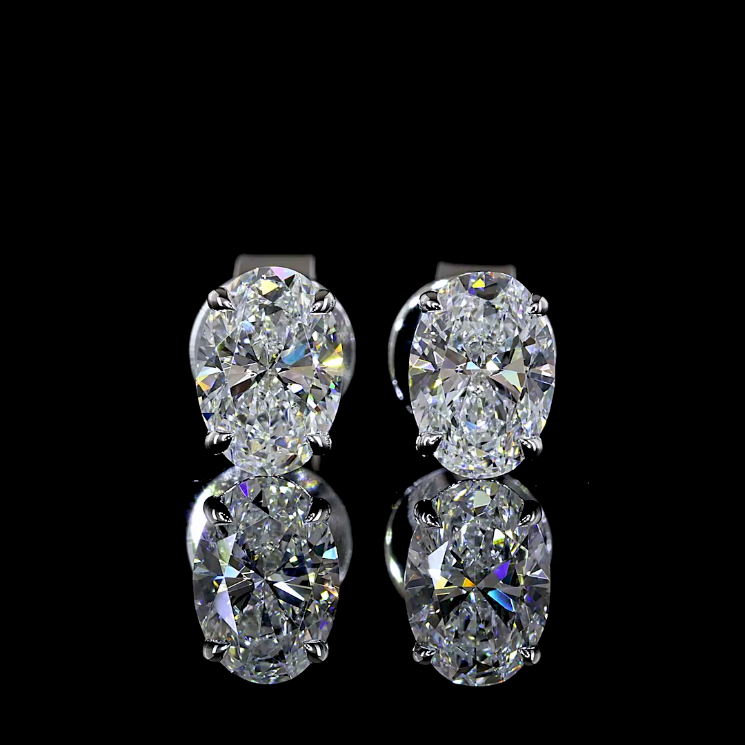 1.09 CT Oval Lab Grown Diamond Stud Earrings in 14K White Gold