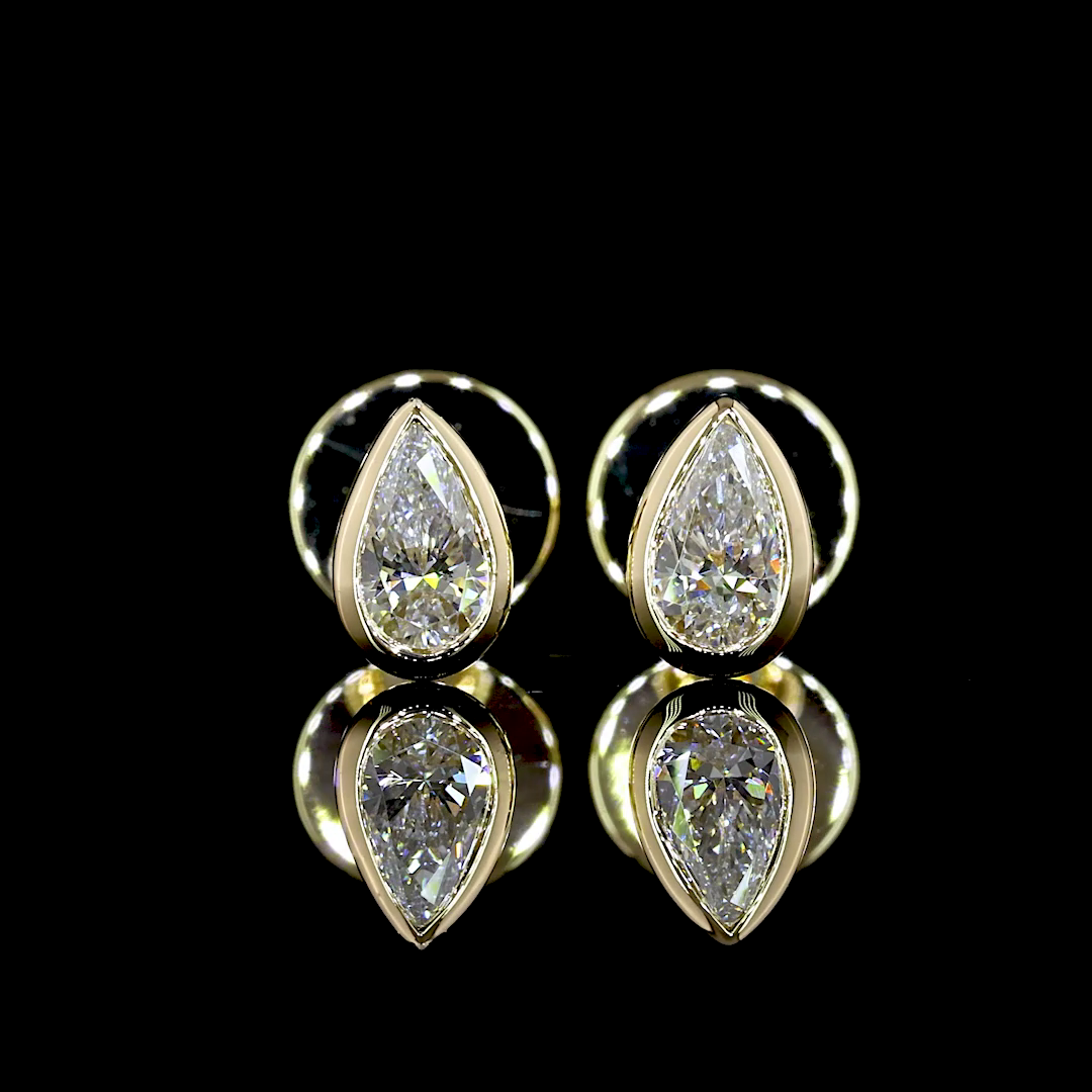 0.3 CT Pear Lab Grown Diamond Stud Earrings in 14K Yellow Gold