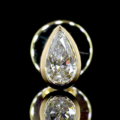 0.3 CT Pear Lab Grown Diamond Stud Earrings in 14K Yellow Gold
