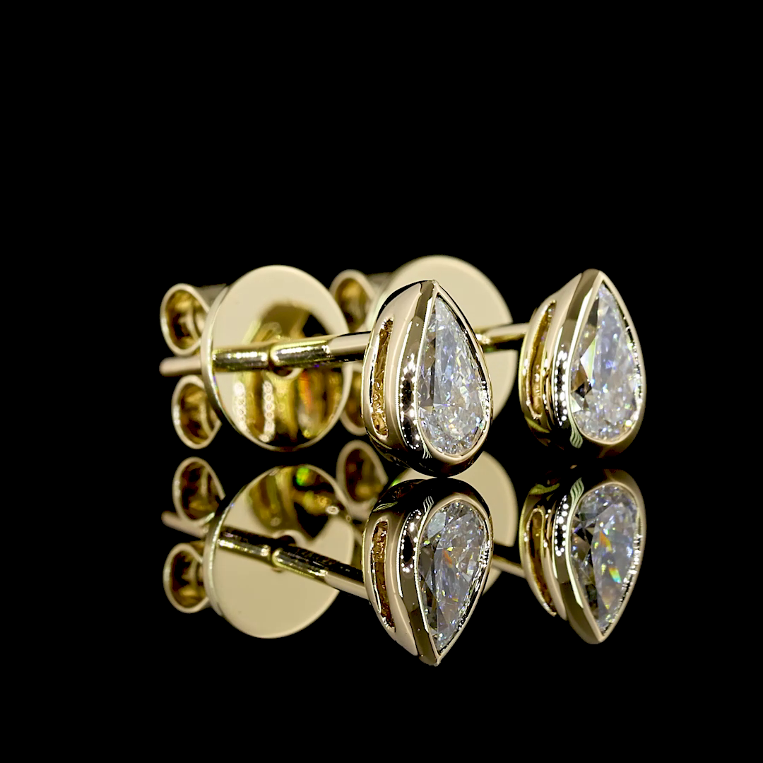 0.3 CT Pear Lab Grown Diamond Stud Earrings in 14K Yellow Gold