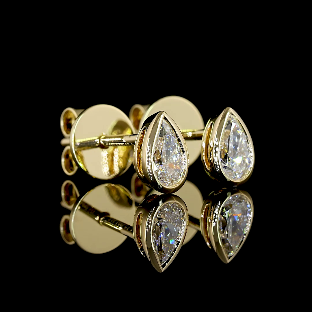 0.33 CT Pear Lab Grown Diamond Stud Earrings in 14K Yellow Gold
