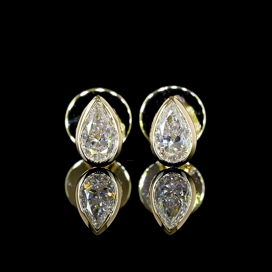 0.33 CT Pear Lab Grown Diamond Stud Earrings in 14K Yellow Gold