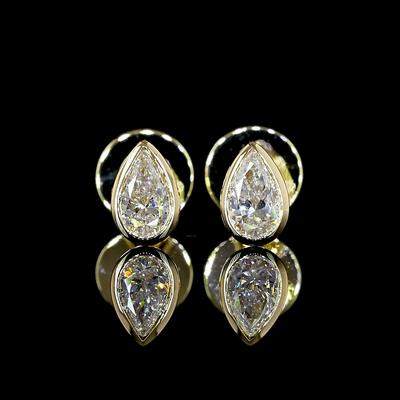 0.33 CT Pear Lab Grown Diamond Stud Earrings in 14K Yellow Gold