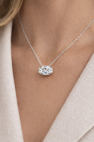 1.0 CT Oval Lab Grown Diamond Solitaire Pendant in 14K White Gold – worn on neck