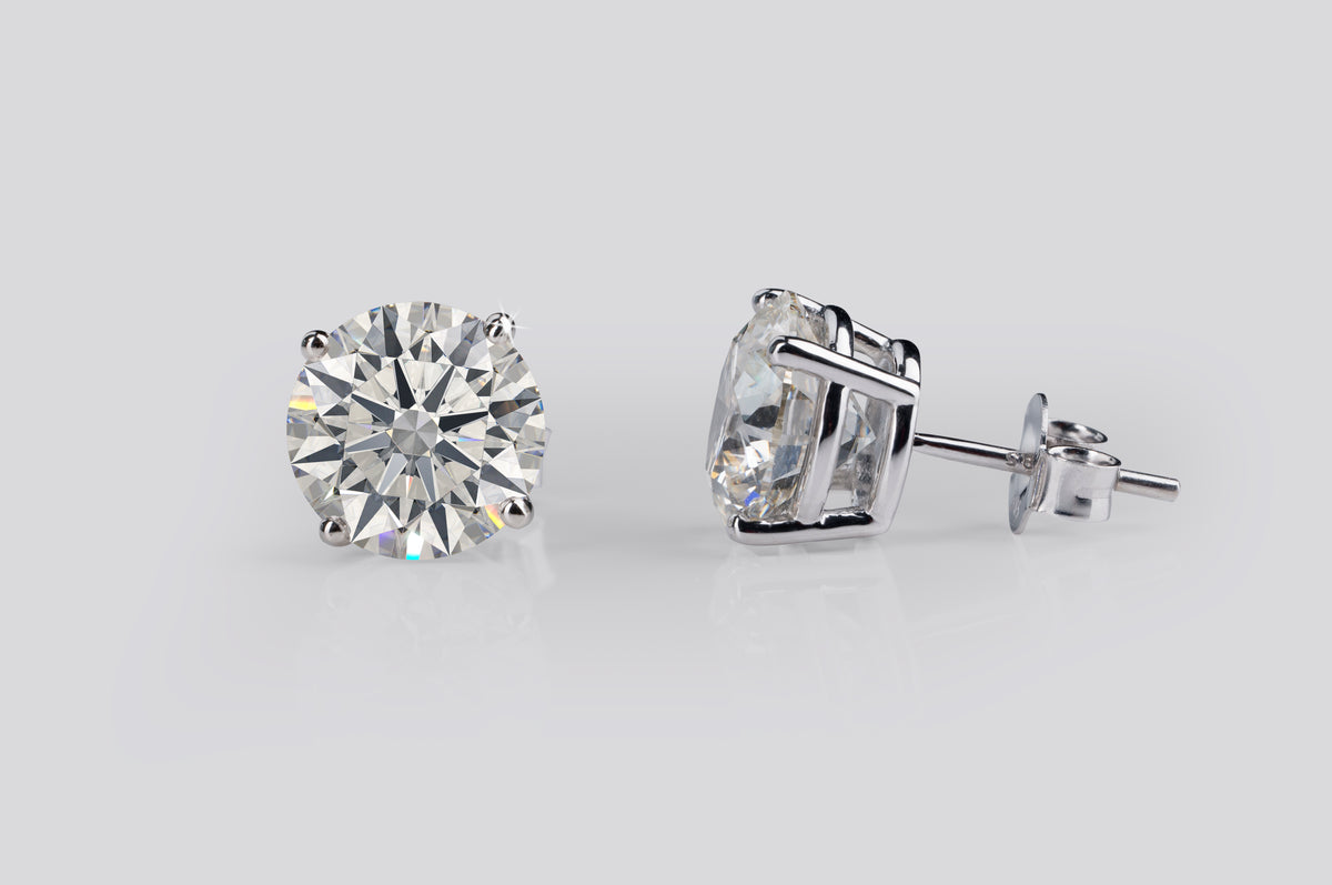 0.82 CT Round Lab Grown Diamond Stud Earrings in 18K White Gold